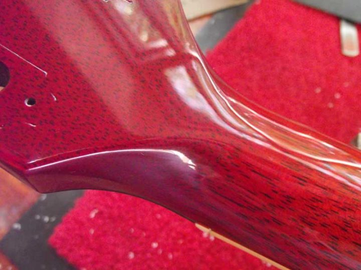 Inserting tuner bushings with a Stewmac bushing press Manchester Guitar Tech