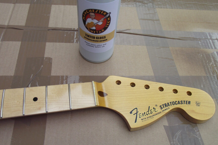 The yellowed headstock face